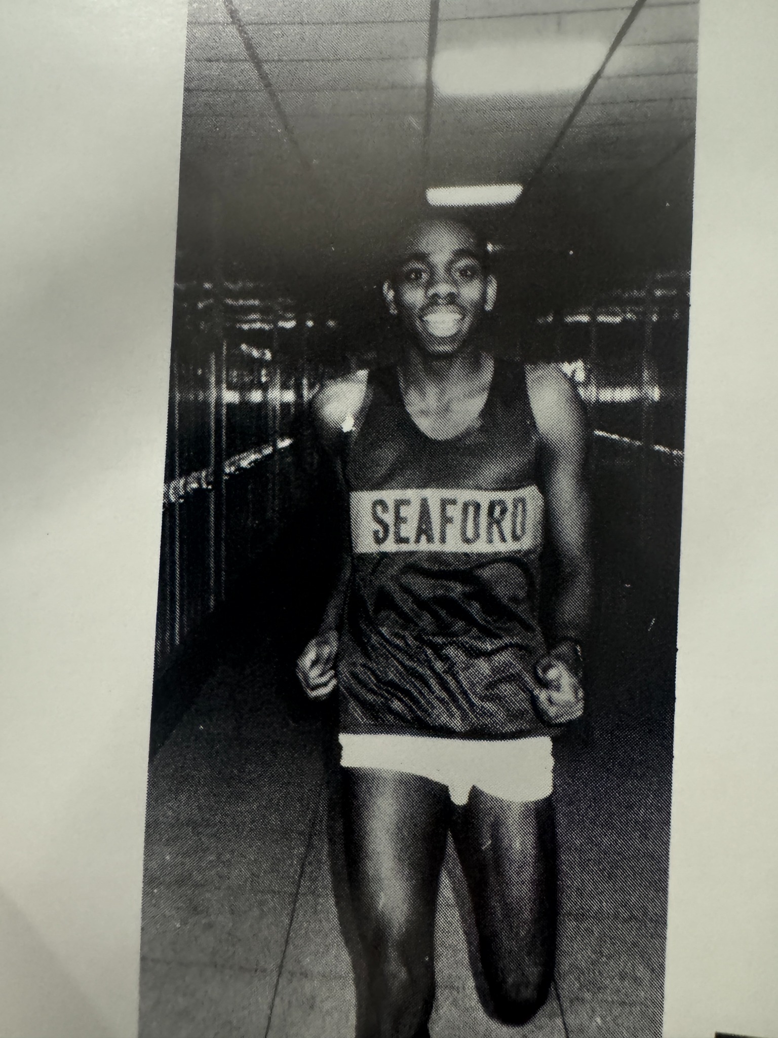 A Seaford athlete in a running uniform.